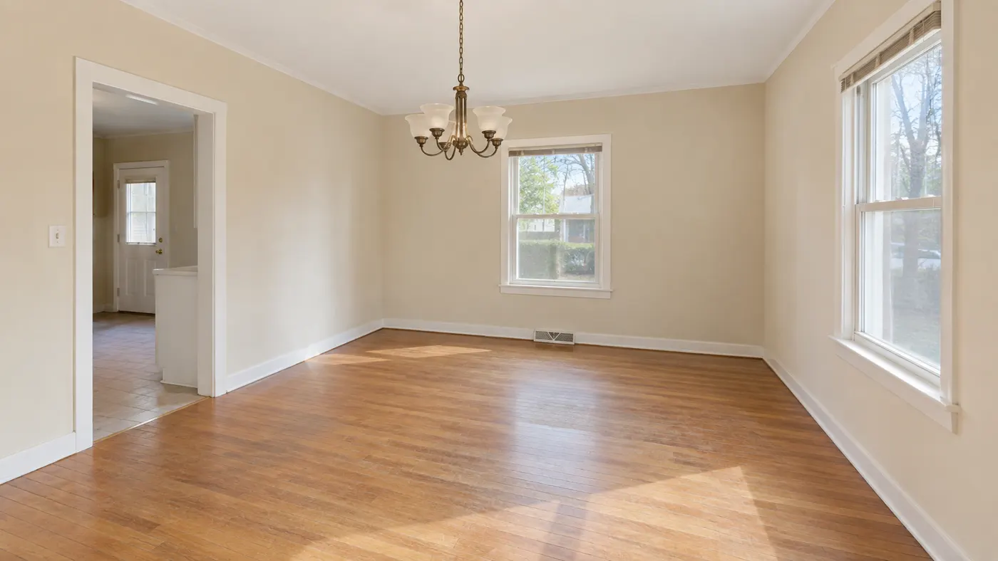 Empty dining room transformed into a furnished listing-ready interior — before